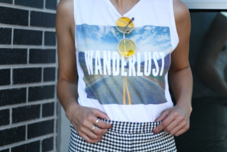 yellow sunglasses and graphic tank