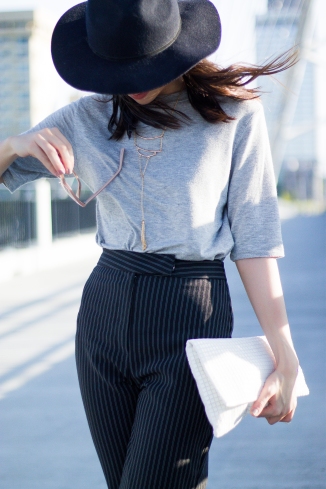 Fashion Outfits: Gray Tee, Black Hat, Striped Pants, and White Clutch
